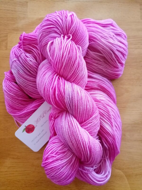 bright pink tonal high twist fingering weight yarn