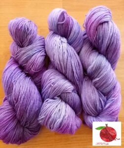 tonal purple yarn with flecks of pink and blue 