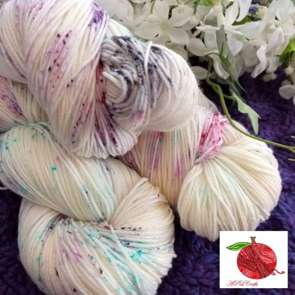 Kathryn Sarah is a delicate colorway of speckles in purples, pinks, aqua and grey.