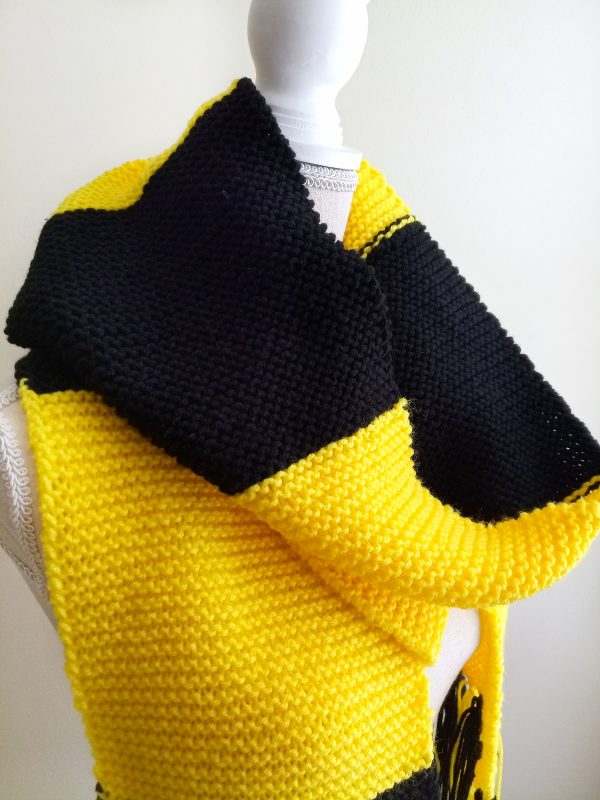 yellow and black squared scarf with fringe