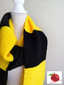 yellow and black squared scarf with fringe