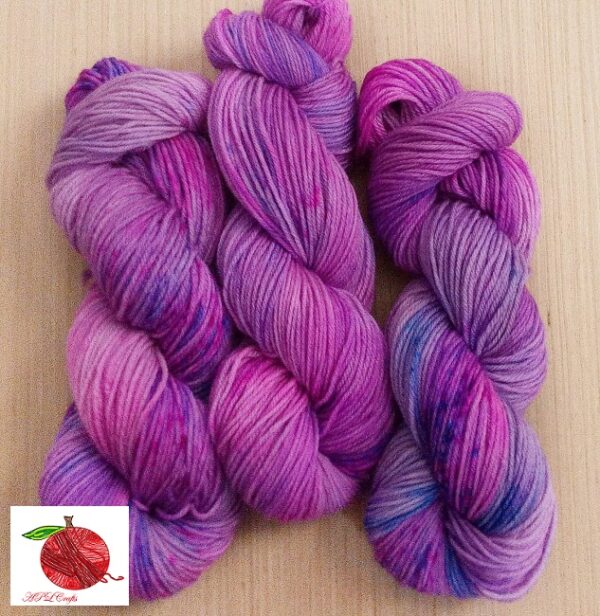 bright pink and purple yarn with blue speckles