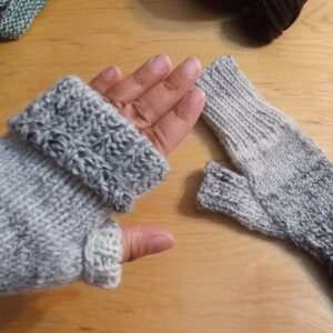 light grey to dark grey gradient fingerless gloves folded over
