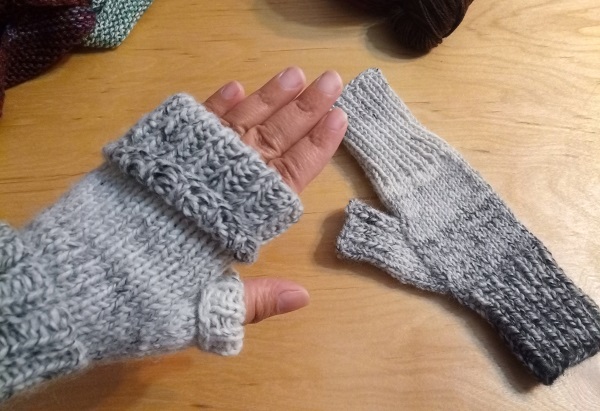 light grey to dark grey gradient fingerless gloves folded over